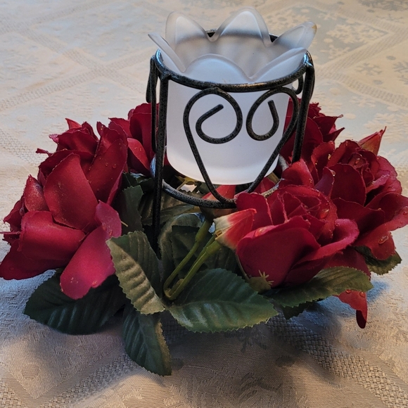 A candle holder centerpiece with red flowers - Picture 2 of 3